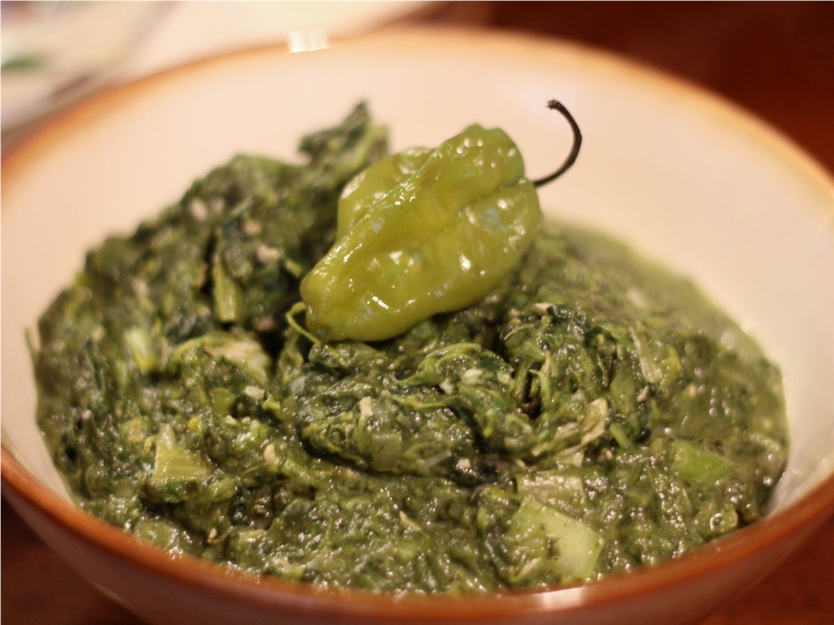 Coconut callaloo, a gluten-free Caribbean dish